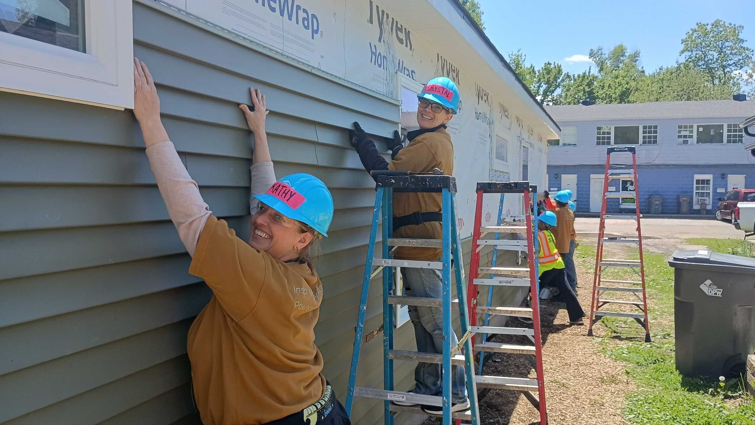 Volunteers doing construction